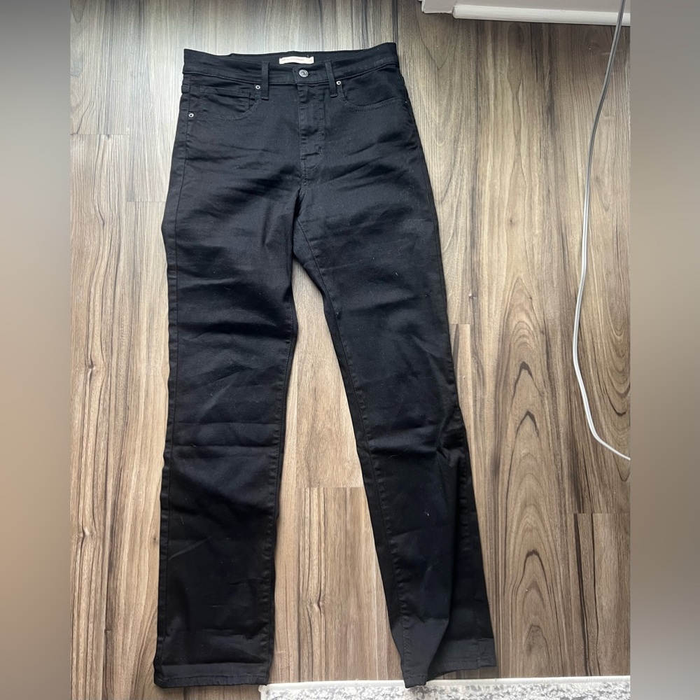 Levi’s black 724 high rise straight jeans